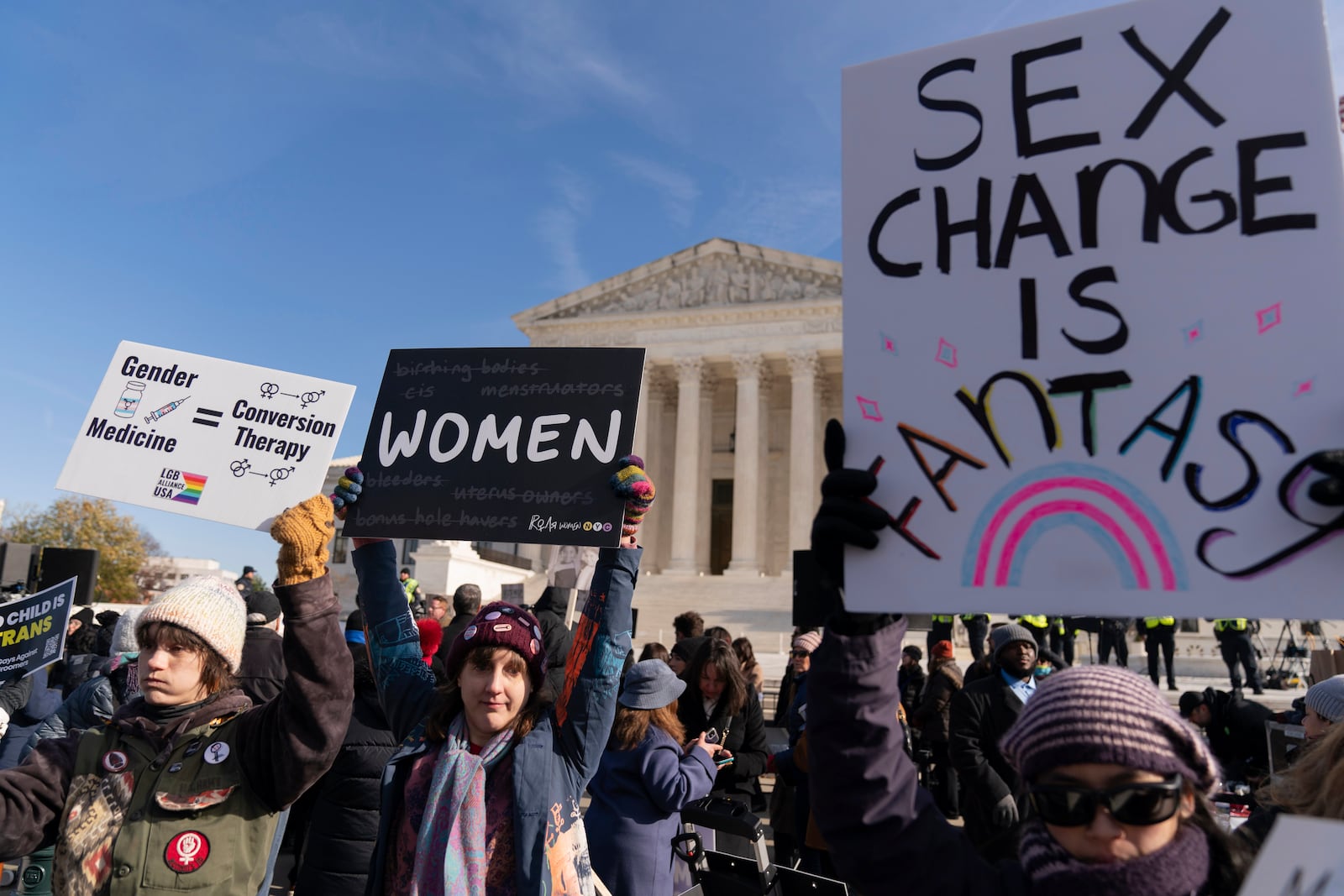 Demonstrators against transgenders rights protest during a rally outside of the Supreme Court, Wednesday, Dec. 4, 2024, in Washington, as arguments begin in a case regarding a Tennessee law banning gender-affirming medical care for transgender youth. (AP Photo/Jose Luis Magana)