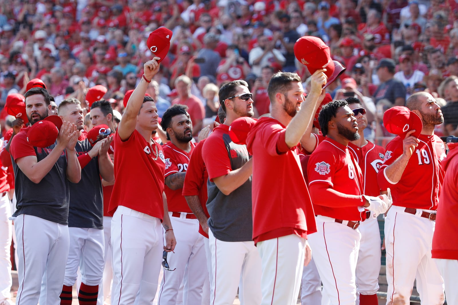 CINCINNATI, OH - SEPTEMBER 26: Cincinnati Reds players and coaches acknowledge radio broadcaster Marty Brennaman after his final game in the booth against the Milwaukee Brewers at Great American Ball Park on September 26, 2019 in Cincinnati, Ohio. The Brewers defeated the Reds 5-3. (Photo by Joe Robbins/Getty Images)