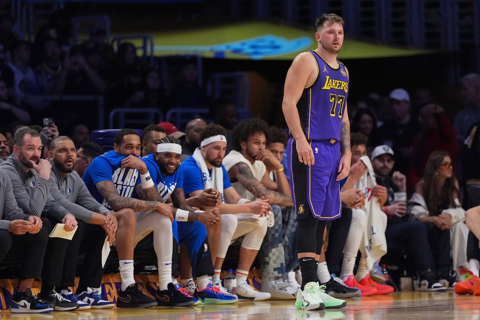 Los Angeles Lakers guard Luka Doncic (77) stands on the court during the second half of an NBA basketball game against the Dallas Mavericks, Tuesday, Feb. 25, 2025, in Los Angeles. (AP Photo/Mark J. Terrill)