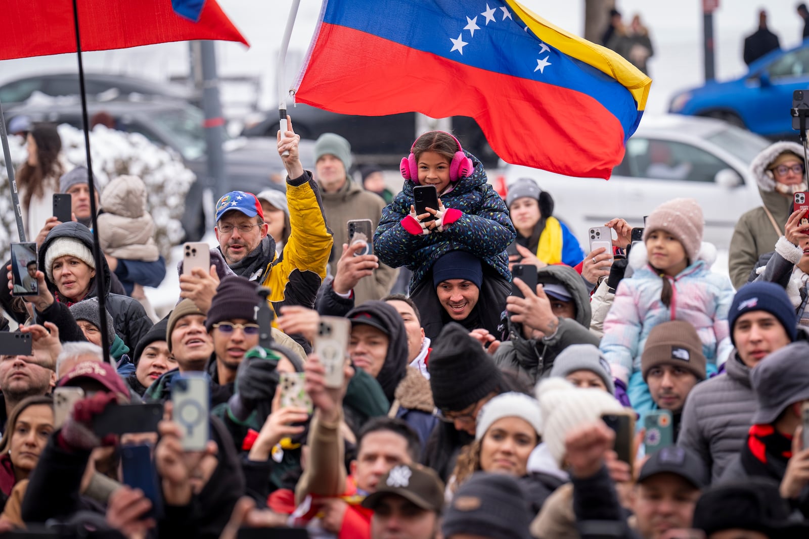 Supporters of Venezuelan opposition leader Edmundo Gonzalez react as he speaks to the group outside of the Organization of American States, Monday, Jan. 6, 2025, in Washington. (AP Photo/Jacquelyn Martin)