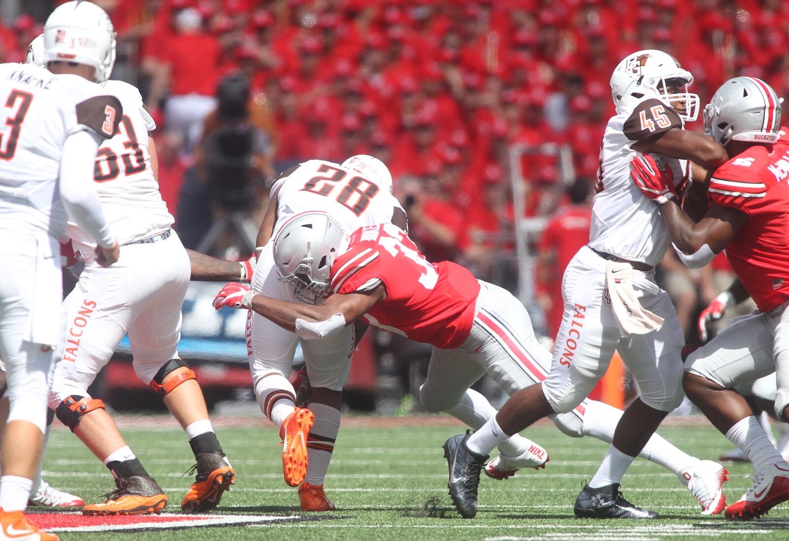 Ohio State’s Dante Booker makes a tackle against Bowling Green on Saturday, Sept. 3, 2016, at Ohio Stadium in Columbus. David Jablonski/Staff