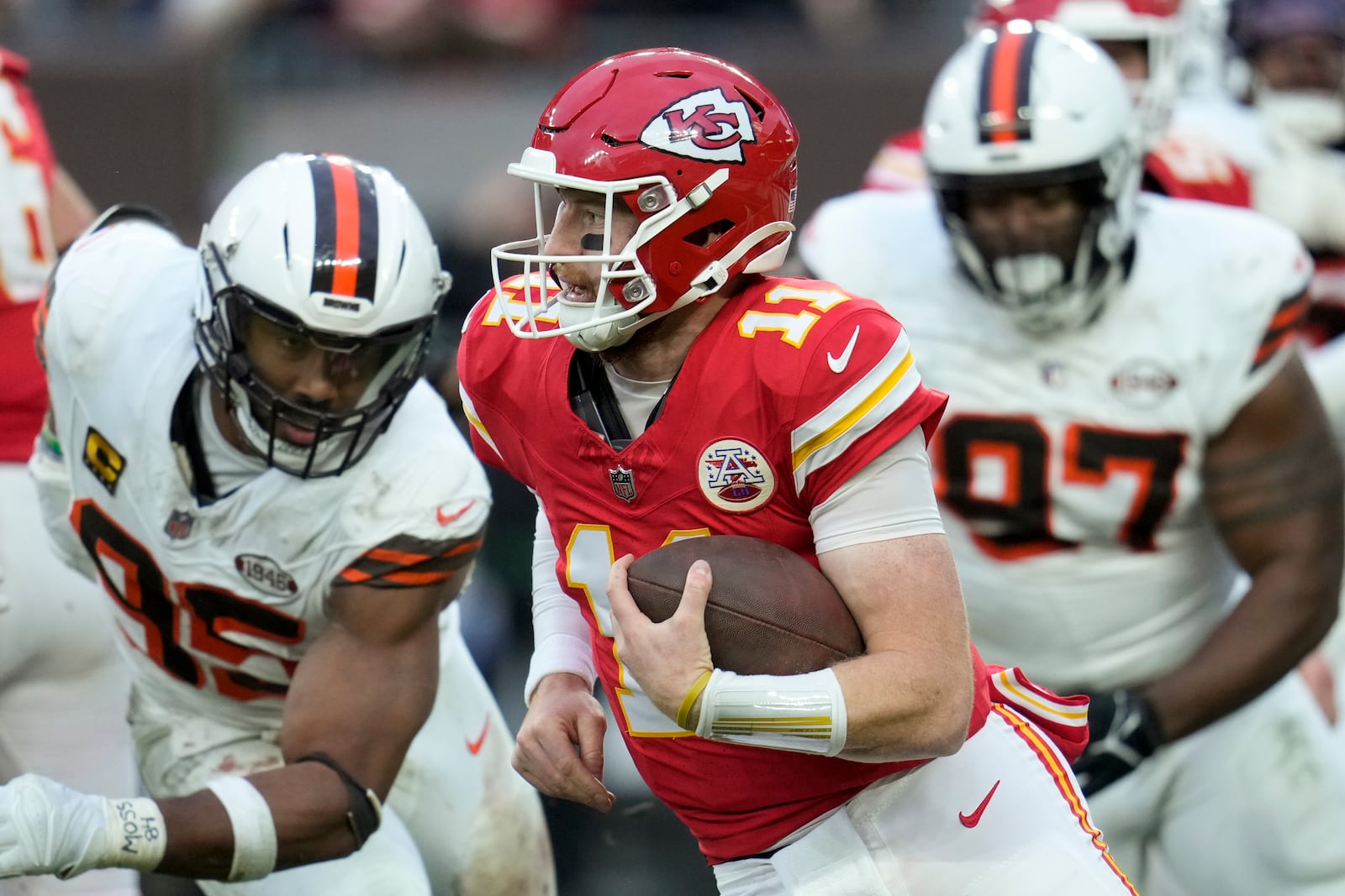 Kansas City Chiefs quarterback Carson Wentz (11) runs against the Cleveland Browns during the second half of an NFL football game, Sunday, Dec. 15, 2024, in Cleveland. (AP Photo/Sue Ogrocki)