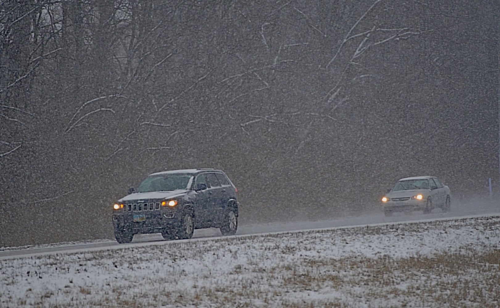 PHOTOS: Snow returns; brutally cold temperature ahead