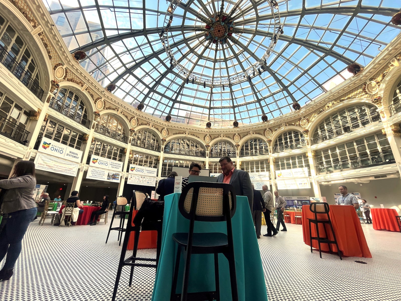 Attendees of the 2023 Heritage Ohio annual conference in the rotunda of the Dayton Arcade on Wednesday, Oct. 11, 2023. CORNELIUS FROLIK / STAFF