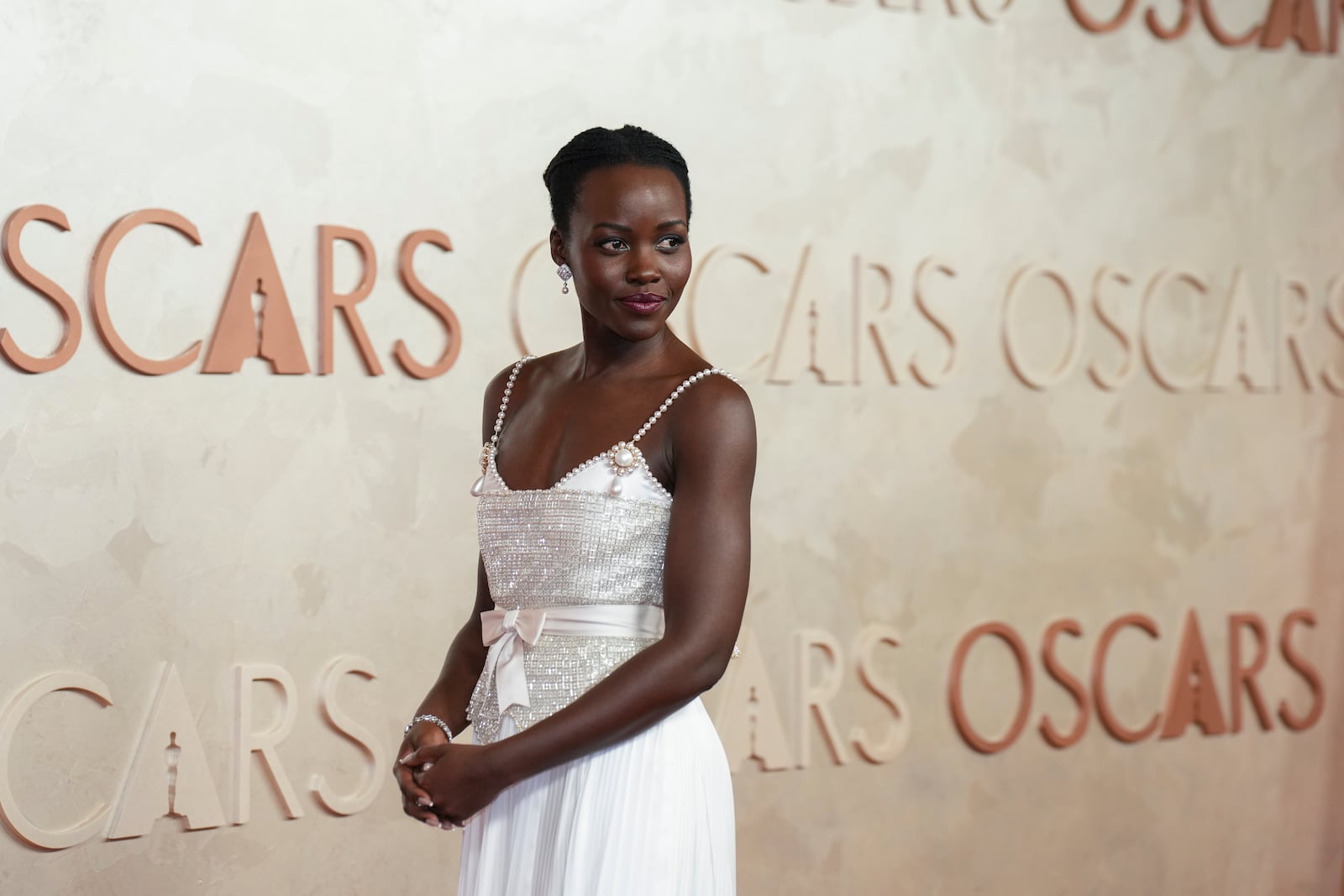 Lupita Nyong'o arrives at the Oscars on Sunday, March 2, 2025, at the Dolby Theatre in Los Angeles. (AP Photo/Jae C. Hong)