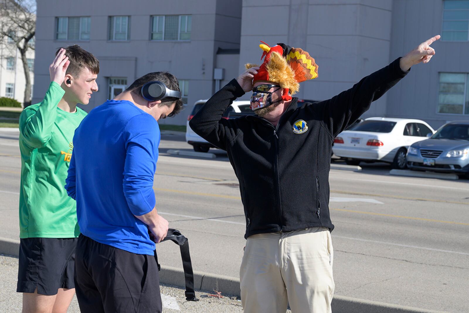 Russell “Taz” Petersen (right), 88th Force Support Squadron fitness program manager, explains the course to participants during the 2020 Turkey Trot 5K Fun Run at Wright-Patterson Air Force Base on Nov. 19. U.S. AIR FORCE PHOTO/WESLEY FARNSWORTH