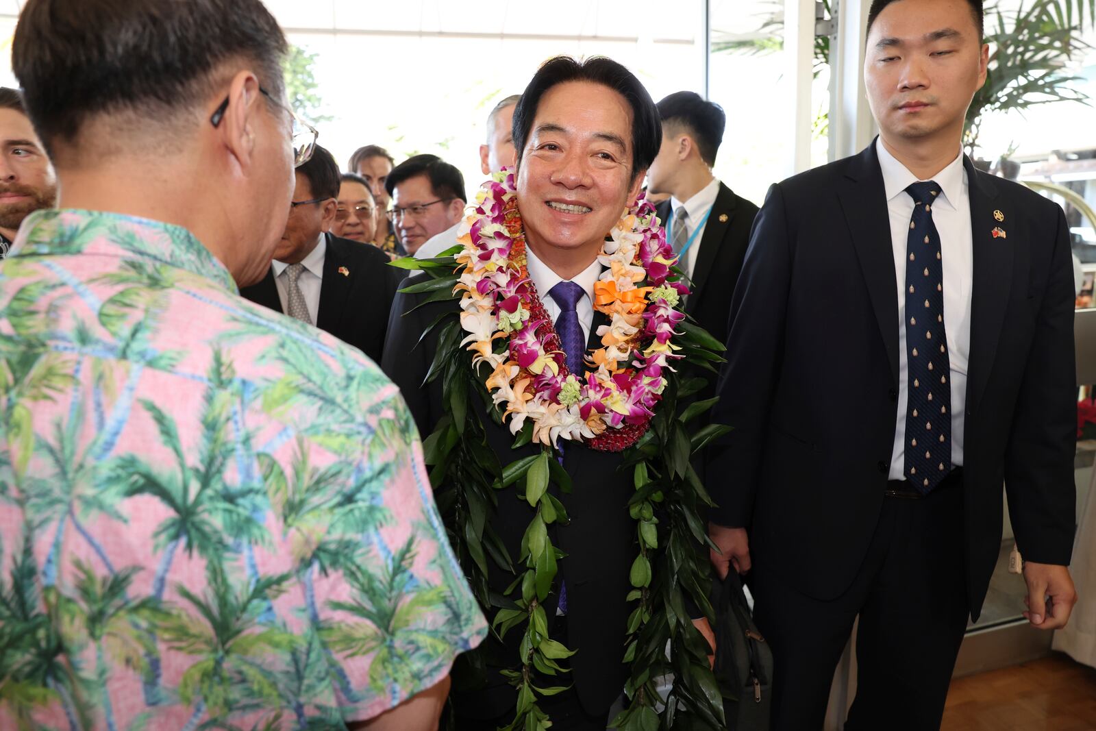 Taiwan President Lai Ching-te, center, arrives at the Kahala Hotel and Resort Saturday, Nov. 30, 2024 in Honolulu. (AP Photo/Marco Garcia)