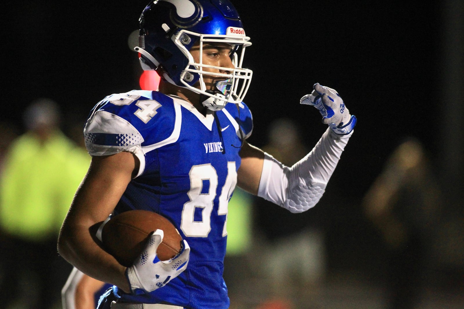 Miamisburg's Jackson McGohan celebrates a touchdown in the final seconds against Springfield on Friday, Oct. 15, 2021, at Holland Field in Miamisburg. David Jablonski/Staff