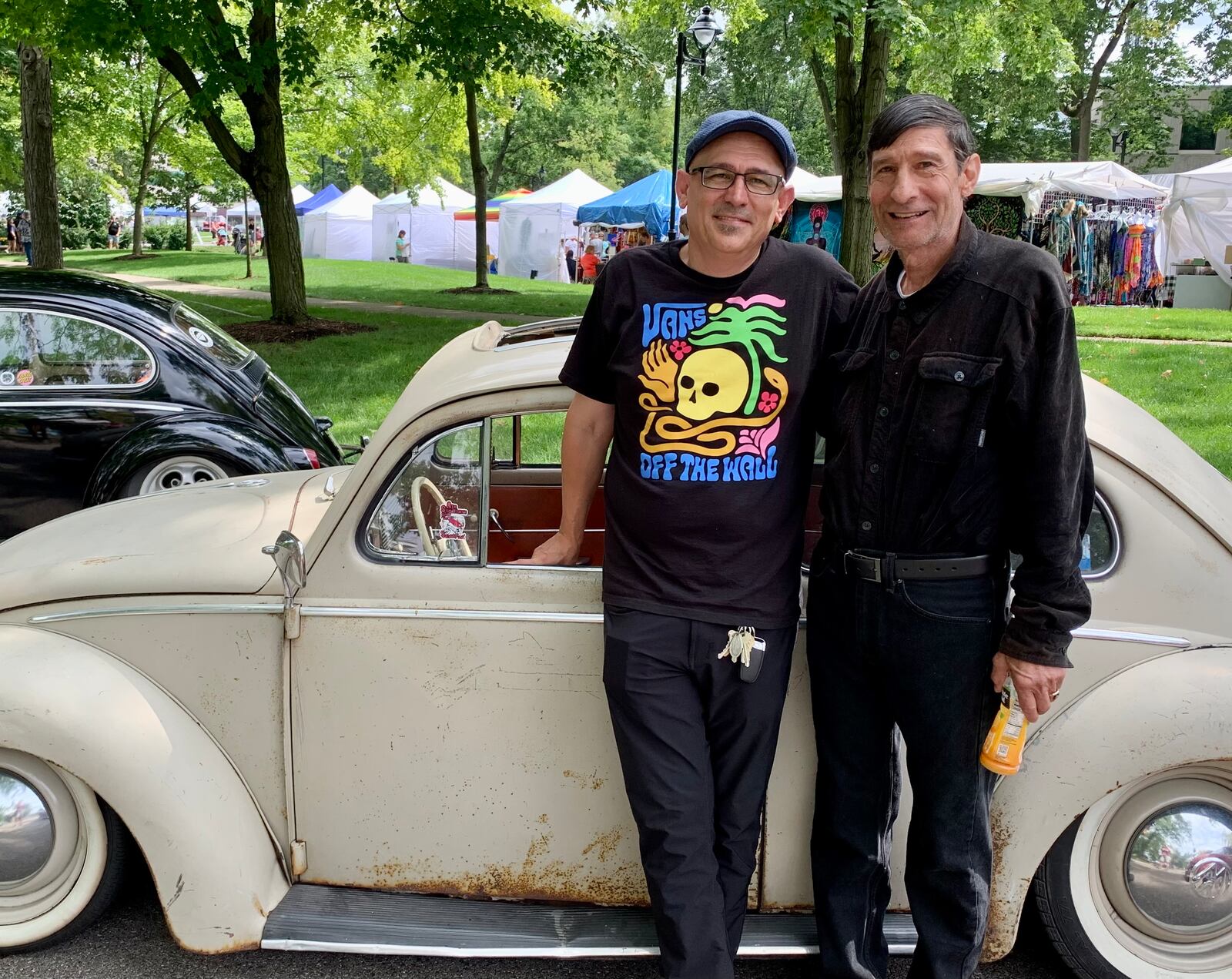 CJ Logo and his father Sam showing a '57 Volkswagen Beetle at the 2022 Kettering Holiday at Home car show. LONDON BISHOP/STAFF