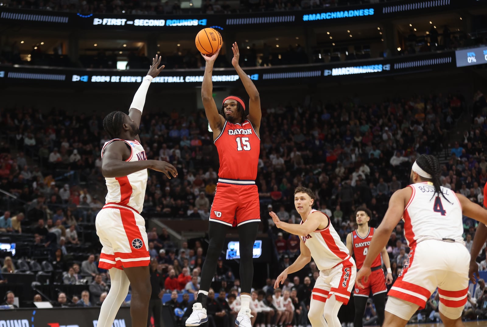 Dayton's DaRon Holmes II scores the first basket of the game against Arizona in the second round of the NCAA tournament on Saturday, March 23, 2024, at the Delta Center in Salt Lake City, Utah. David Jablonski/Staff