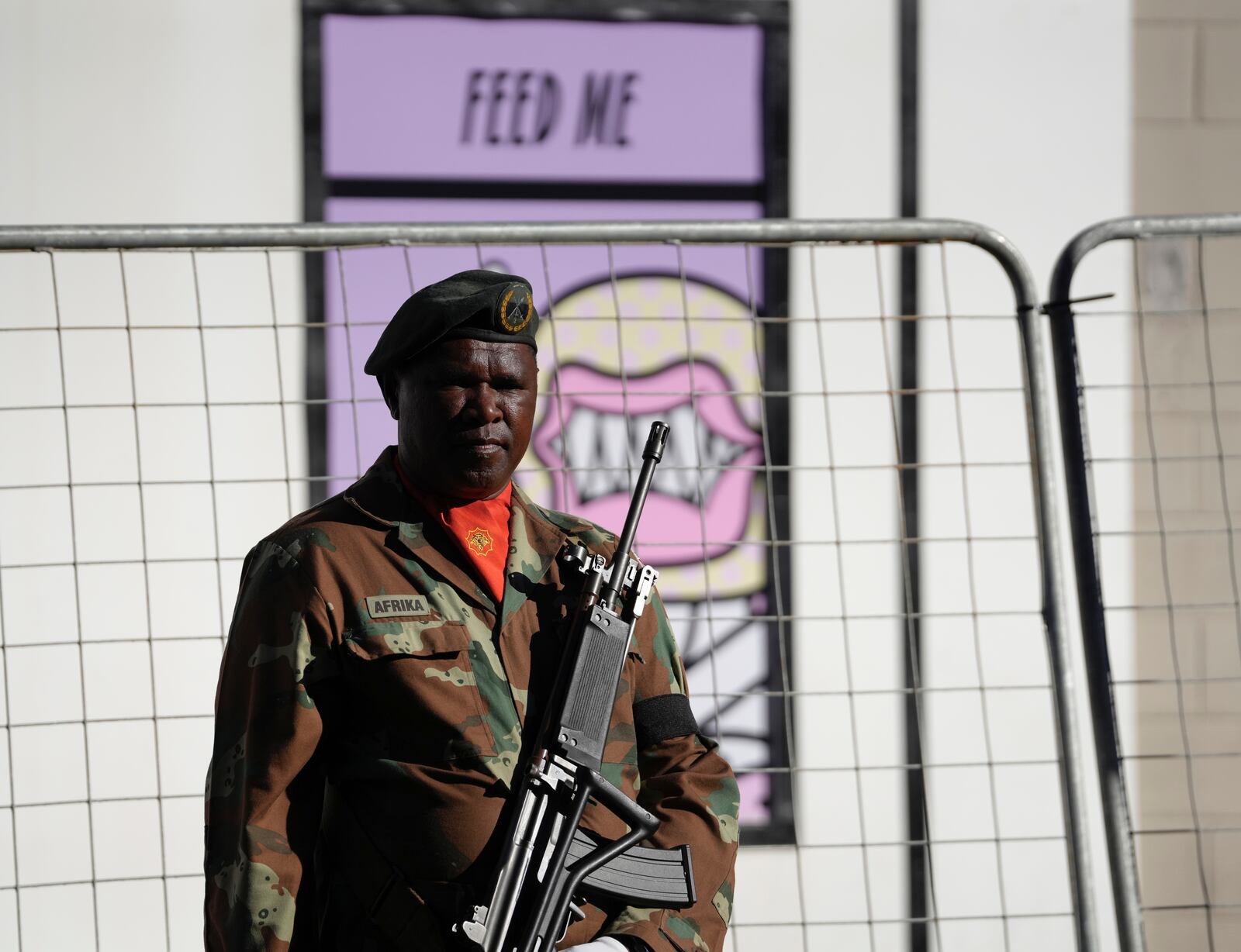 A South African soldier stands on the street leading to Cape Town's city hall where South African President Cyril Ramaphosa will deliver his annual state of the union address, Thursday, Feb. 6, 2025. (AP Photo/Nardus Engelbrecht)