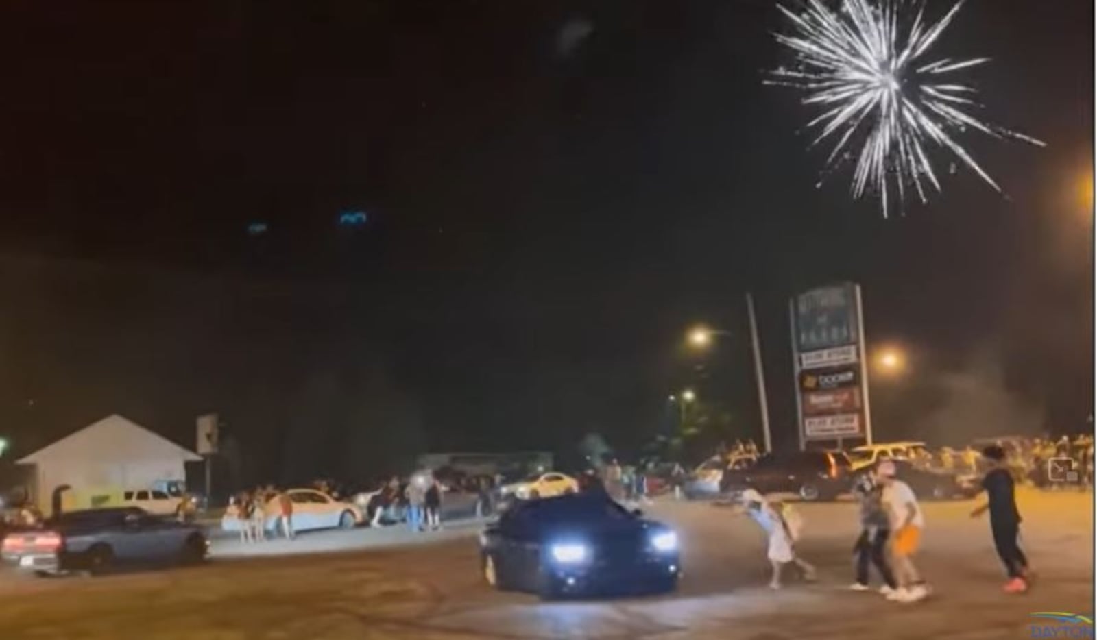 Dayton police said drivers did donuts, burnouts and engaged in other "reckless" driving behaviors  in the parking lot of Gettysburg Plaza in northwest Dayton during the Fourth of July in 2022. Officials also people fired off dangerous, high-grade fireworks. This is a screenshot from a video posted online from the shopping center that day. CONTRIBUTED