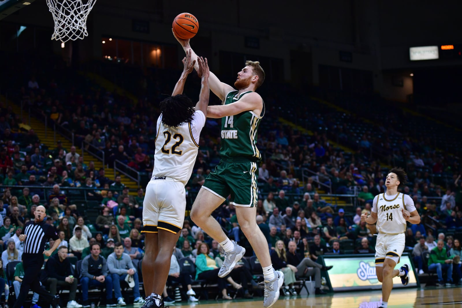 Wright State's Brandon Noel shoots over Northern Kentucky's Michael Bradley during a game at the Nutter Center. Joe Craven/WSU Athletics