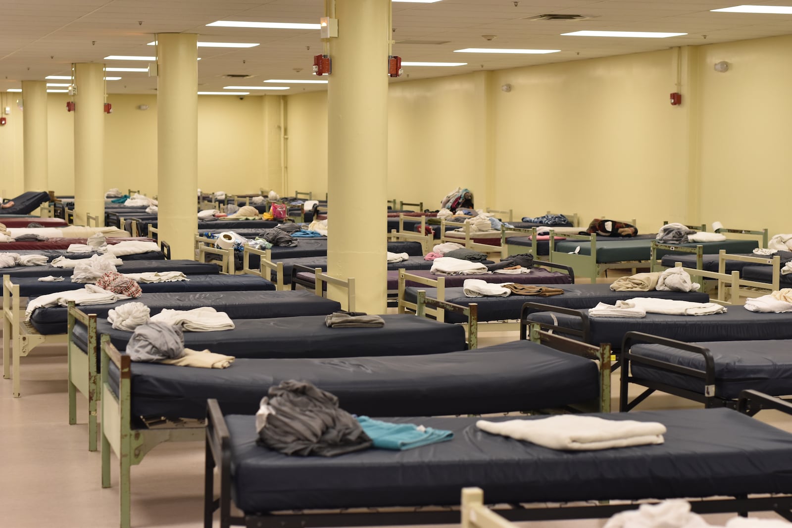 Beds in one of the dorms at the Shelter for Women and Families at St. Vincent de Paul Society, Dayton. CORNELIUS FROLIK / STAFF