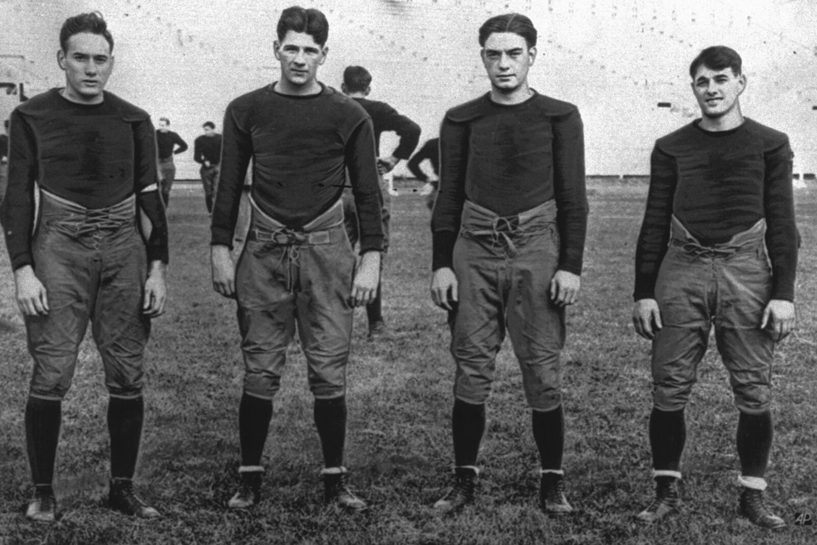 FILE - In this 1924, file photo, Notre Dame's infamous backfield, "The Four Horsemen," from left, Don Miller, Elmer Layden, Jim Crowley and Harry Stuhldreherare pose on the practice field in South Bend, Ind. (AP Photo/File)