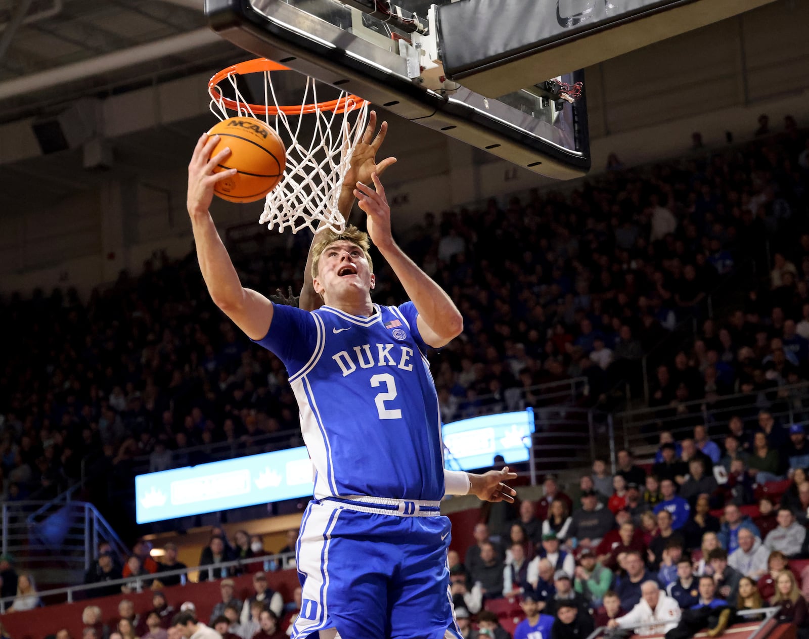 Duke guard Cooper Flagg (2) scores during the first half of an NCAA college basketball game against Boston College, Saturday, Jan. 18, 2025, in Boston. (AP Photo/Mark Stockwell)