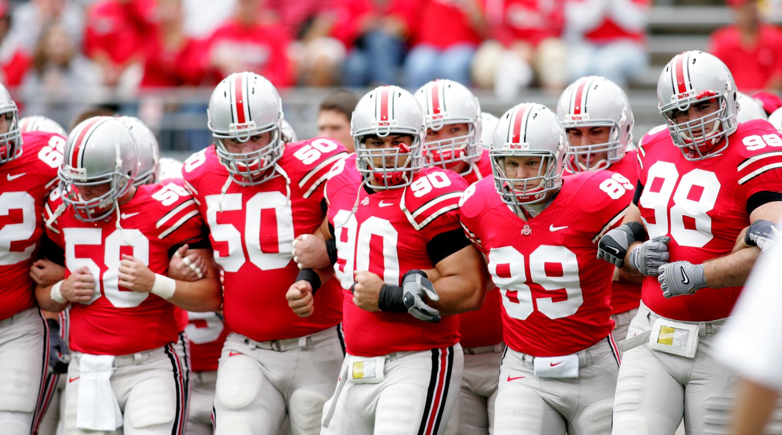 23 Sept 06 Photo by Ron Alvey. The Buckeyes take the field as they host Penn State. Ohio State went on to win by the score of 28 to 6. Quinn Pitcock (90), a Piqua High School graduate, is a starting defensive lineman and Ohio State captain. STAFF