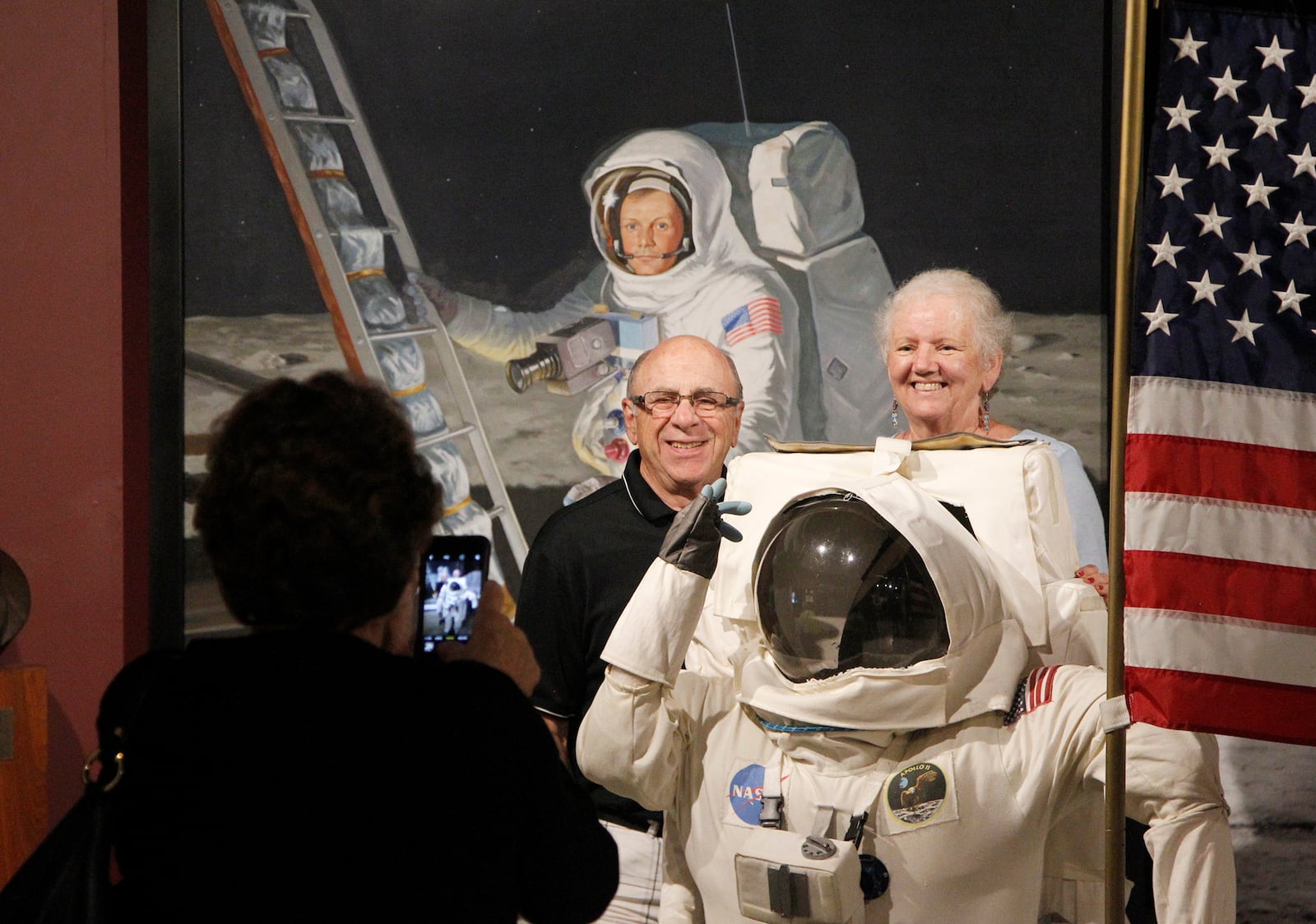 Visitors pose for a photograph at the Armstrong Air & Space Museum in Wapakoneta. July 20 is the 50th anniversary of the Apollo 11 mission and native son, Neil Armstrong was the first to step foot on the moon. LISA POWELL / STAFF