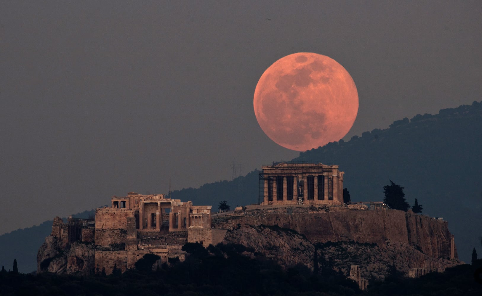 Photos: 'Super snow moon,' largest supermoon of 2019, lights up the sky