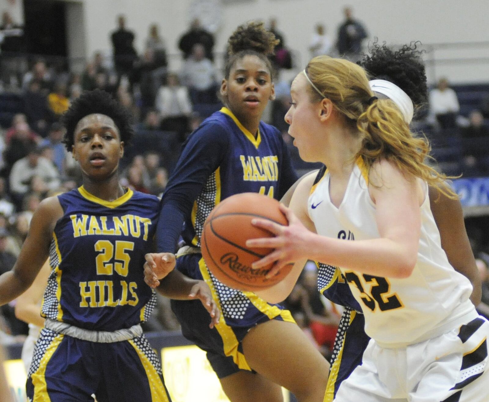 Sam Chable of Centerville (with ball) gets behind Darian Burgin (25) and Kennedi Myles of Walnut Hills. Centerville defeated Cin. Walnut Hills 54-39 in a girls high school basketball D-I regional final at Fairmont’s Trent Arena on Wednesday, March 6, 2019. MARC PENDLETON / STAFF