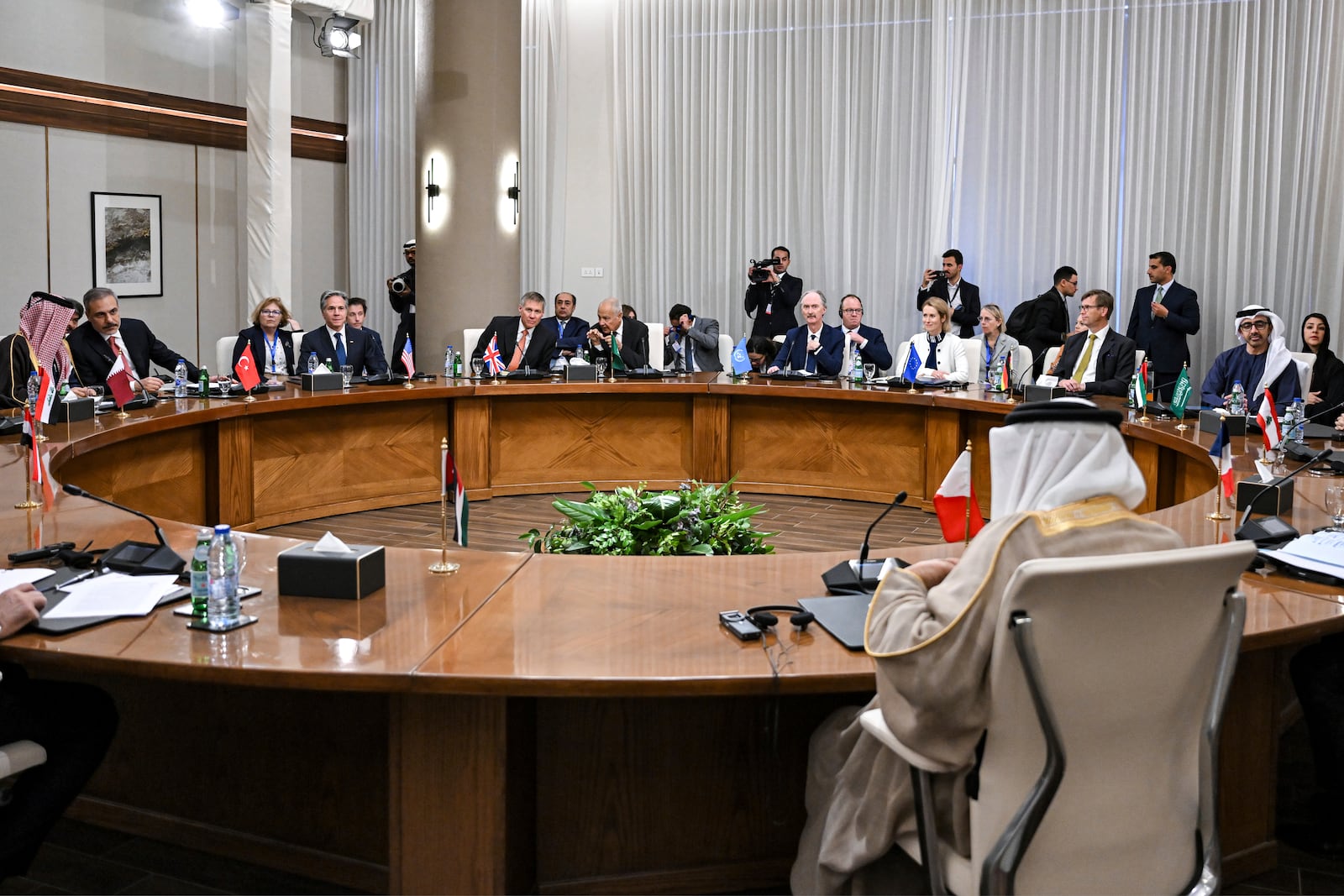 Qatar's Foreign Minister Sheikh Mohammed bin Abdulrahman bin Jassim al-Thani, Turkey's Foreign Minister Hakan Fidan, US Secretary of State Antony Blinken, UN Special Envoy for Syria Geir Pedersen, UAE Foreign Minister Sheikh Abdullah bin Zayed al-Nahyan and others attend the meeting of the Arab Contact Group on Syria in Jordan's southern Red Sea coastal city of Aqaba, Saturday Dec. 14, 2024. (Andrew Caballero-Reynolds/Pool via AP)