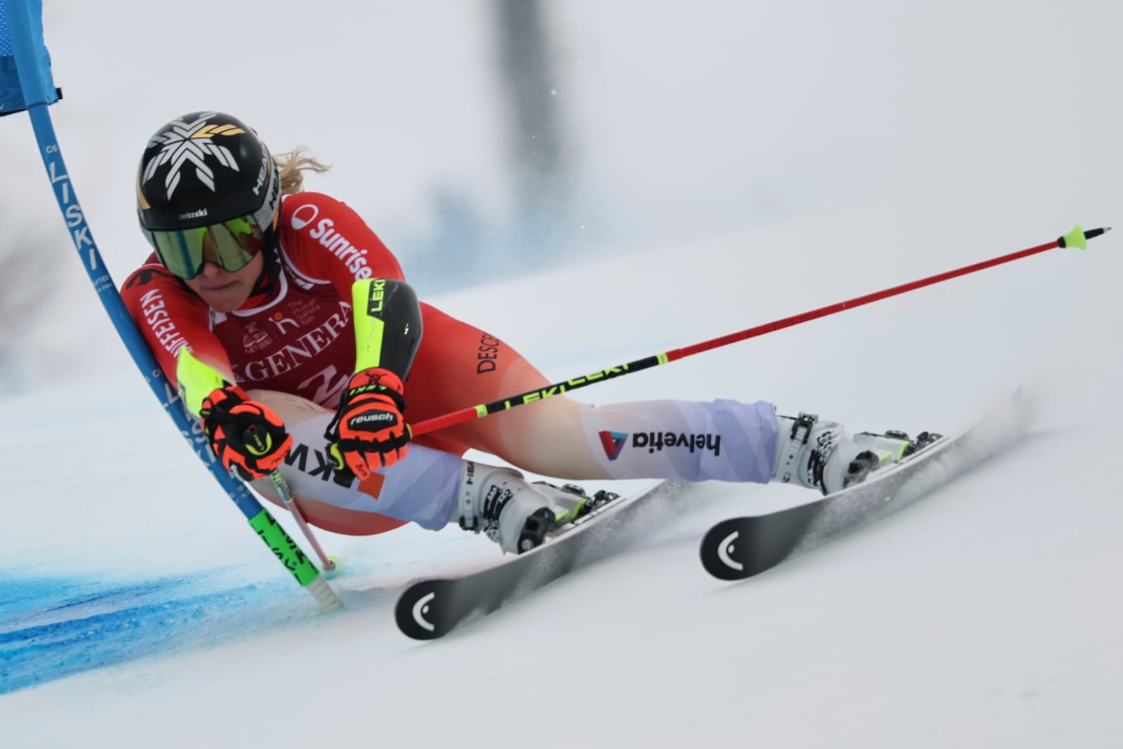 Switzerland's Lara Gut Behrami speeds down the course during an alpine ski, women's World Cup giant slalom, in Sestriere, Italy, Saturday, Feb. 22, 2025. (AP Photo/Marco Trovati)