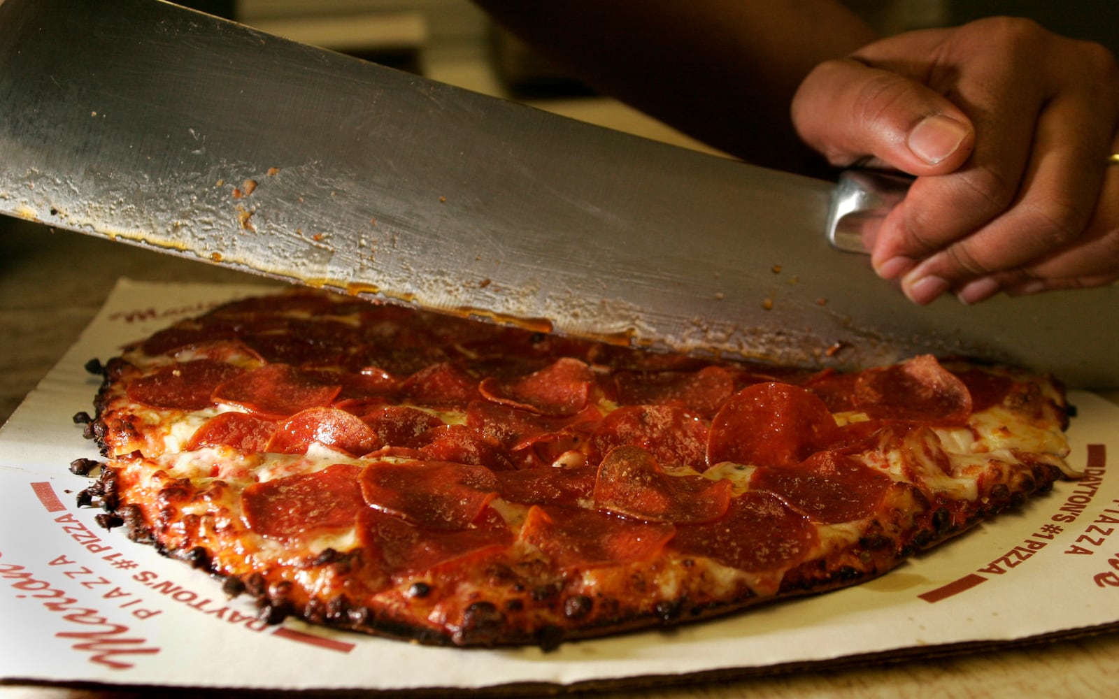 One of Marion's Piazza's pepperoni pizzas is cut into the iconic squares.