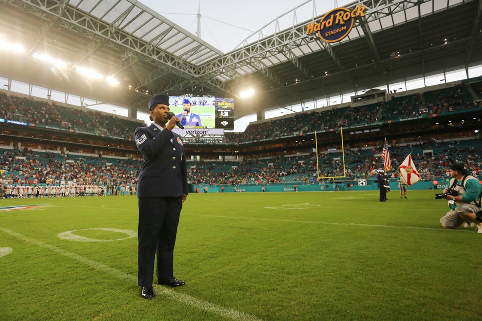 Master Sgt. Tiffany Porterfield, command munitions manager, Headquarters, Air Force Materiel Command, sings the national anthem during a community event. CONTRIBUTED PHOTO