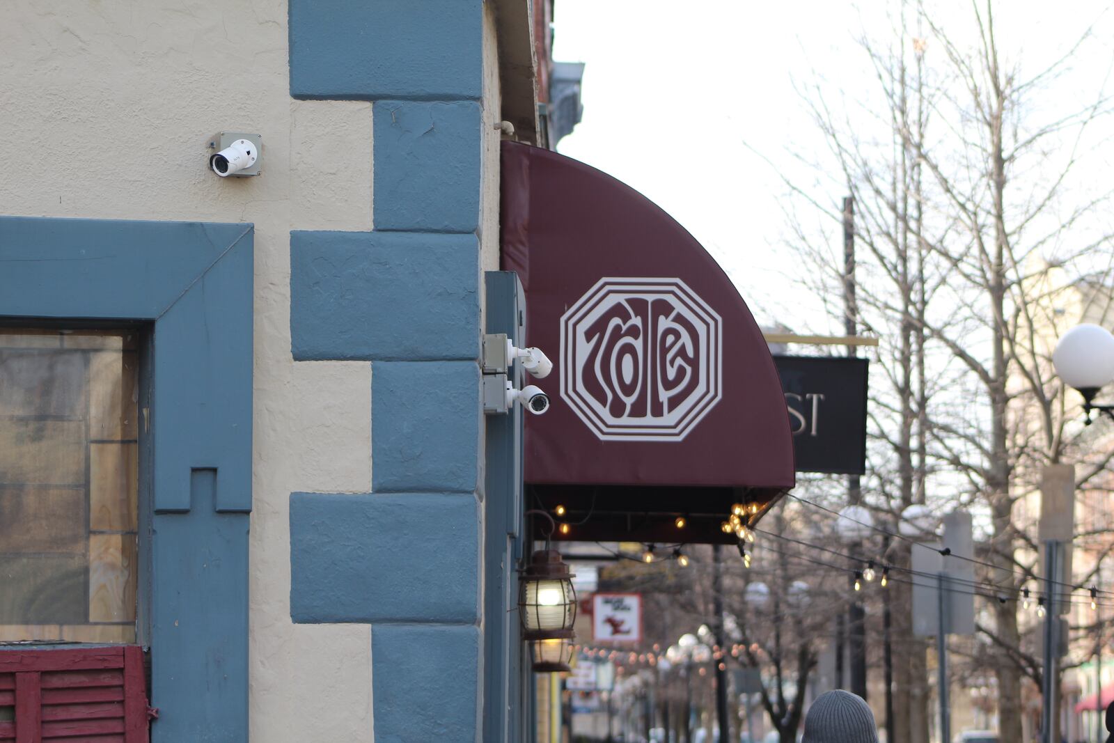 Security cameras outside of a business in the Oregon District in Dayton. CORNELIUS FROLIK / STAFF