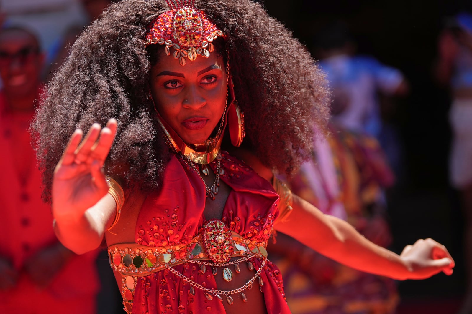 A dancer performs during the ceremony that officially kicks off Carnival in Rio de Janeiro, Brazil, Friday, Feb. 28, 2025. (AP Photo/Silvia Izquierdo)