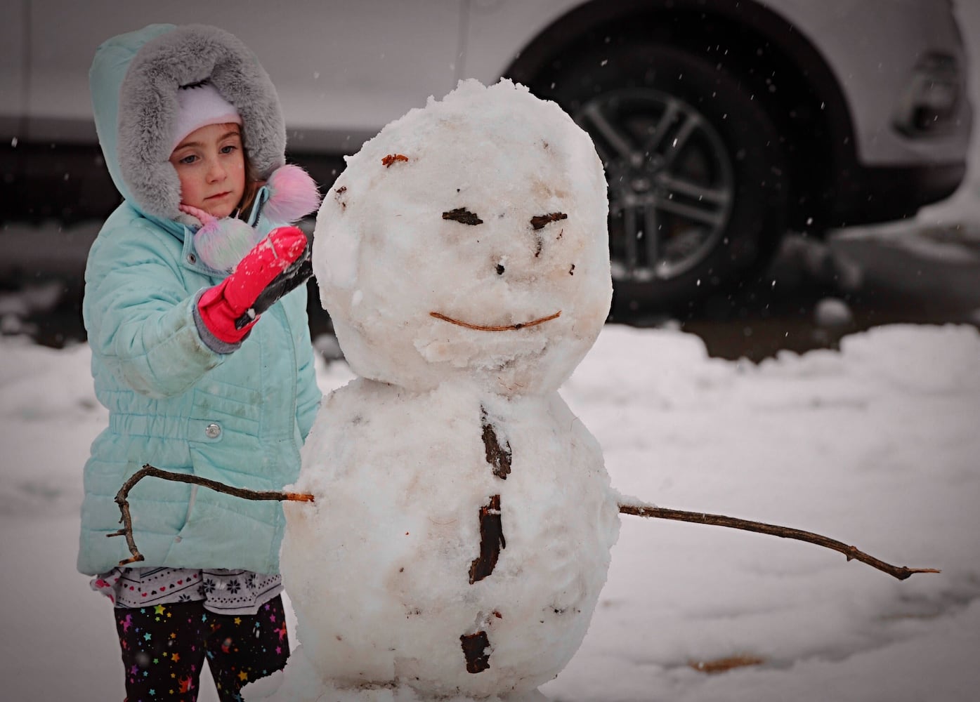 PHOTOS: First heavy snowfall of the season hits the Miami Valley