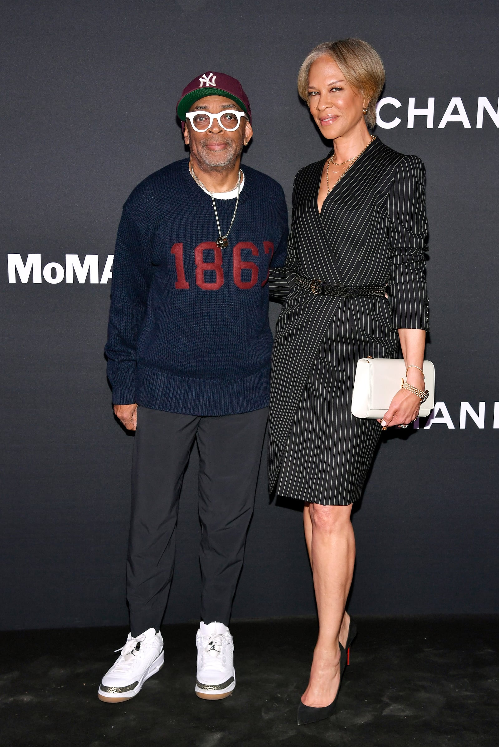 Spike Lee, left, and Tonya Lewis Lee attend the 16th annual Museum of Modern Art Film Benefit, presented by Chanel, honoring Samuel L. Jackson on Wednesday, Oct. 23, 2024, in New York. (Photo by Evan Agostini/Invision/AP)