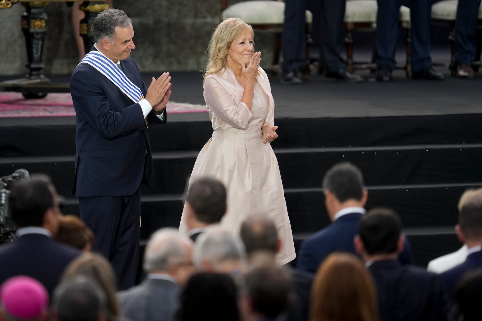 Uruguay's incoming President Yamandu Orsi and Vice President Carolina Cosse attend an Inauguration Day ceremony, in Montevideo, Uruguay, Saturday, March 1, 2025. (AP Photo/Matilde Campodonico)