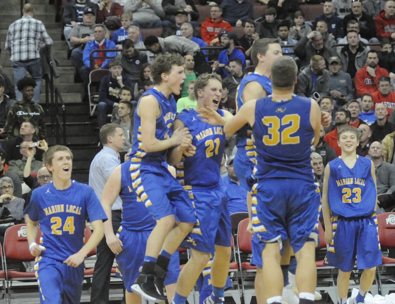 Marion Local players celebrate. Marion Local defeated Pandora-Gilboa 56-54 in a D-IV boys high school basketball state semifinal at OSU’s Schottenstein Center on Thursday, March 22, 2018. MARC PENDLETON / STAFF