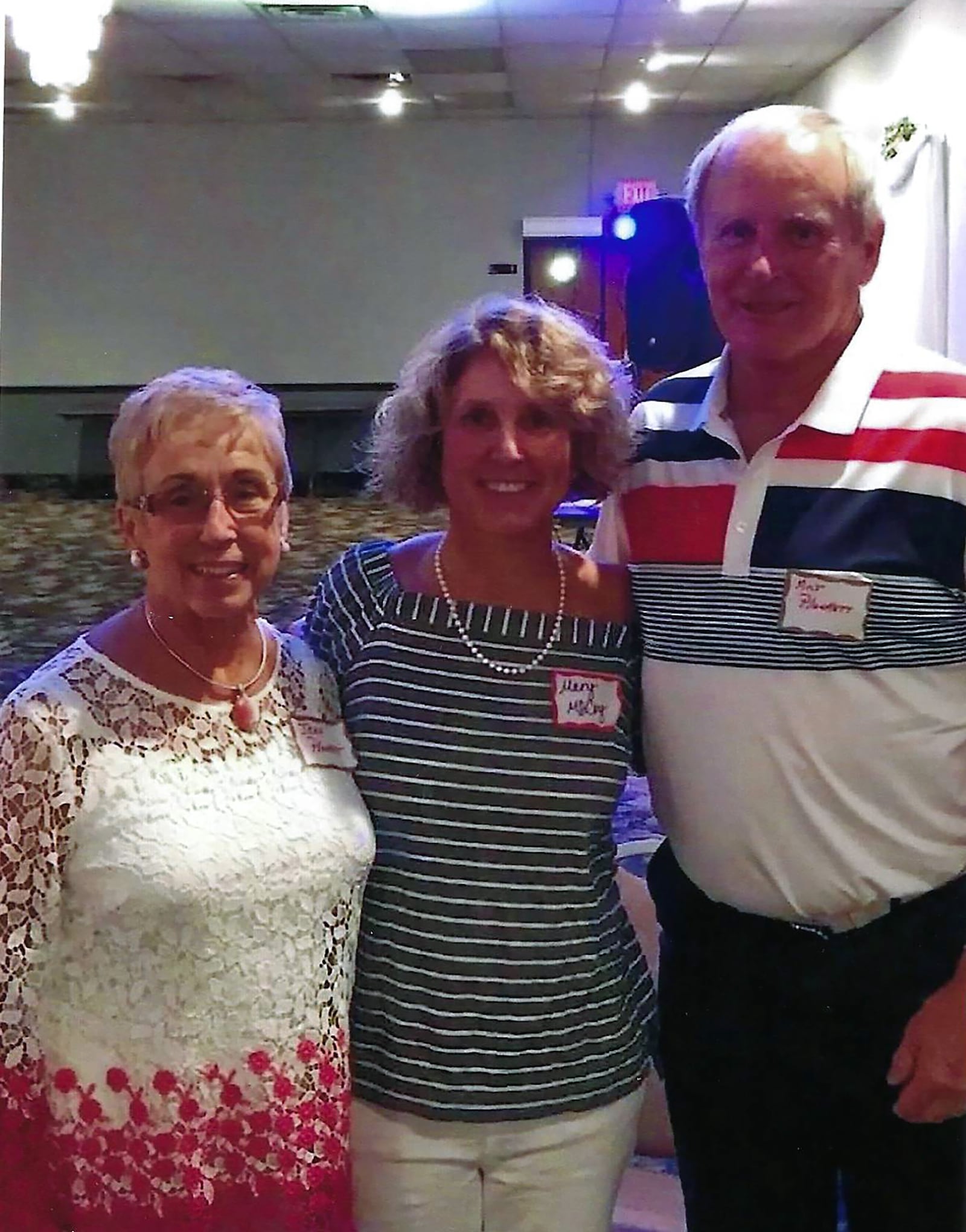 Jean, left, and Milt, right, with Stebbins class of 1978 member Mary McCoy, center, at the 45th class reunion in 2018. CONTRIBUTION