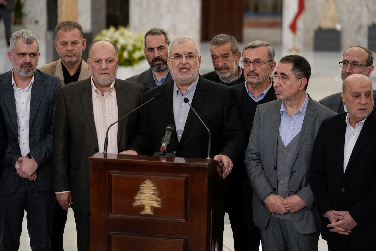 The head of Hezbollah's parliamentary bloc, Mohammed Raad, center, speaks to journalists after his meeting with Lebanese President Joseph Aoun, at the presidential palace in Baabda, east of Beirut, Lebanon, Monday, Jan. 13, 2025. (AP Photo/Bilal Hussein)