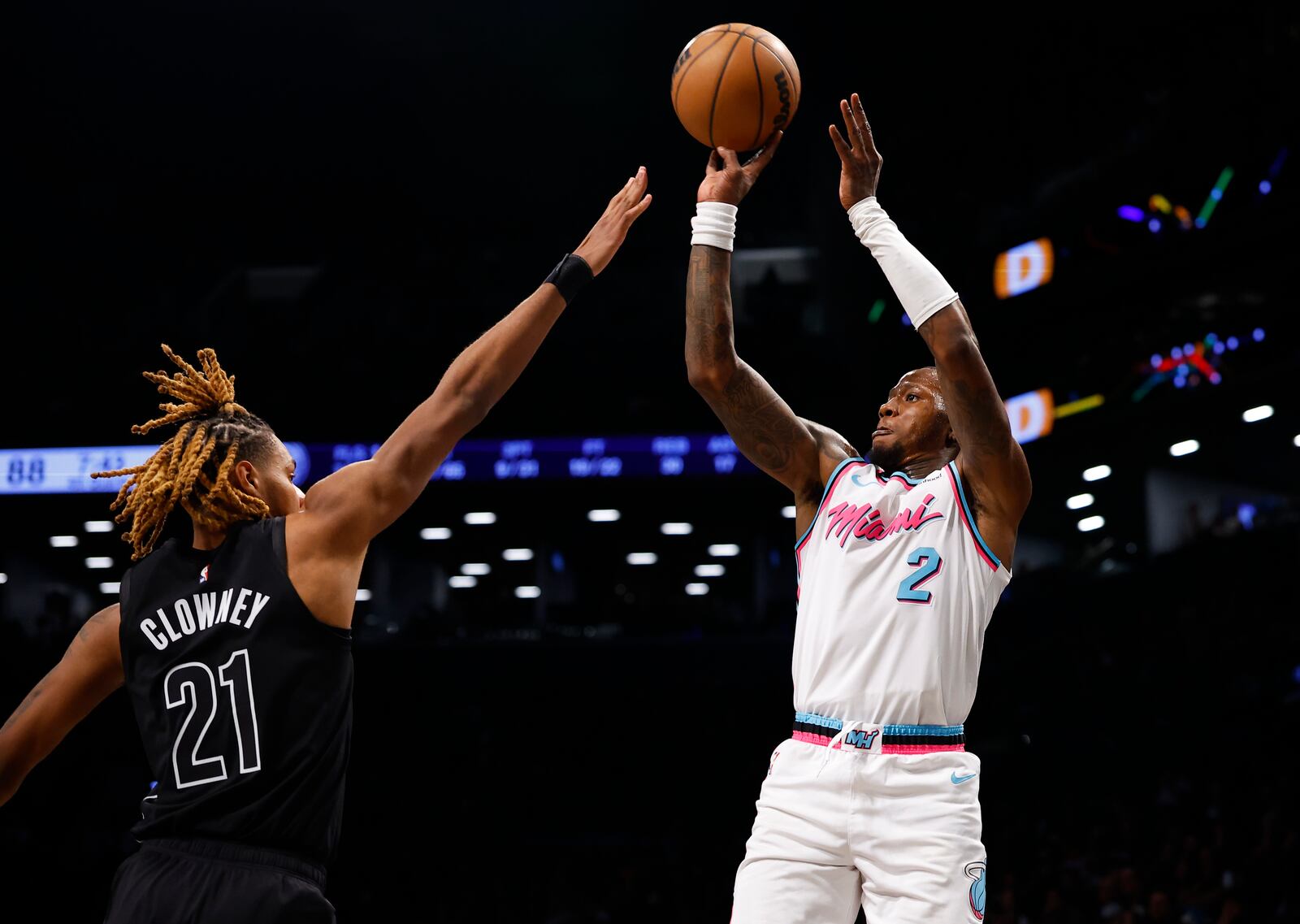 Miami Heat guard Terry Rozier (2) shoots over Brooklyn Nets forward Noah Clowney (21) during the second half of an NBA basketball game, Saturday, Jan. 25, 2025, in New York. (AP Photo/Noah K. Murray)