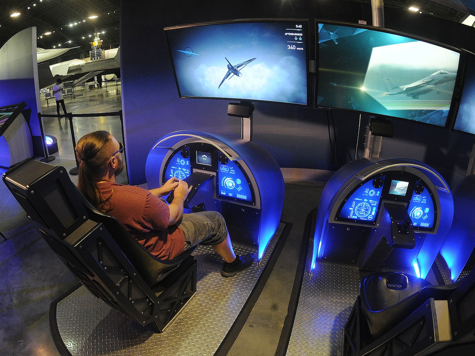 You can design a virtual airplane and fly it on a flight simulation at the "Above and Beyond' exhibit at the National Museum of the U.S. Air Force. MARSHALL GORBY\STAFF