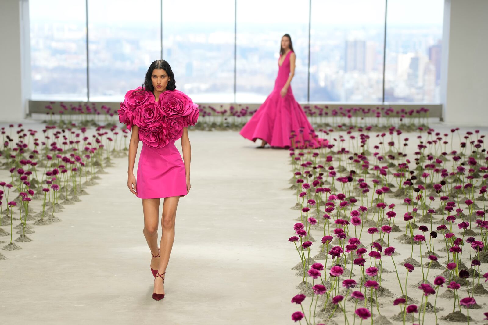 Models walk the runway during the Carolina Herrera Fall/Winter 2025 fashion show as part of New York Fashion Week on Monday, Feb. 10, 2025, in New York. (Photo by Charles Sykes/Invision/AP)