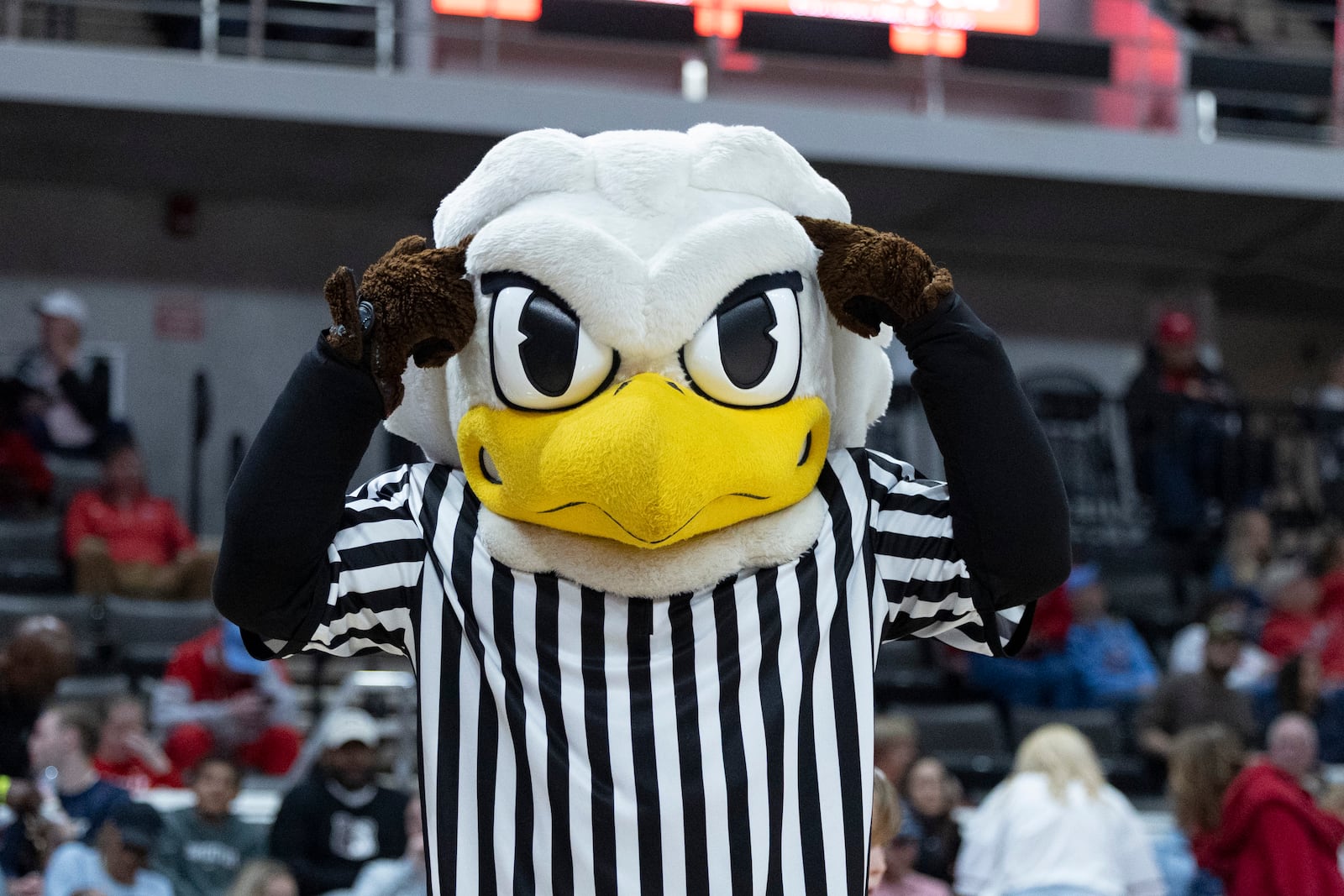 Liberty mascot Sparky performs before the first half of an NCAA college basketball game in the championship of the Conference USA tournament, Saturday, March 15, 2025, in Huntsville, Ala. (AP Photo/Vasha Hunt)