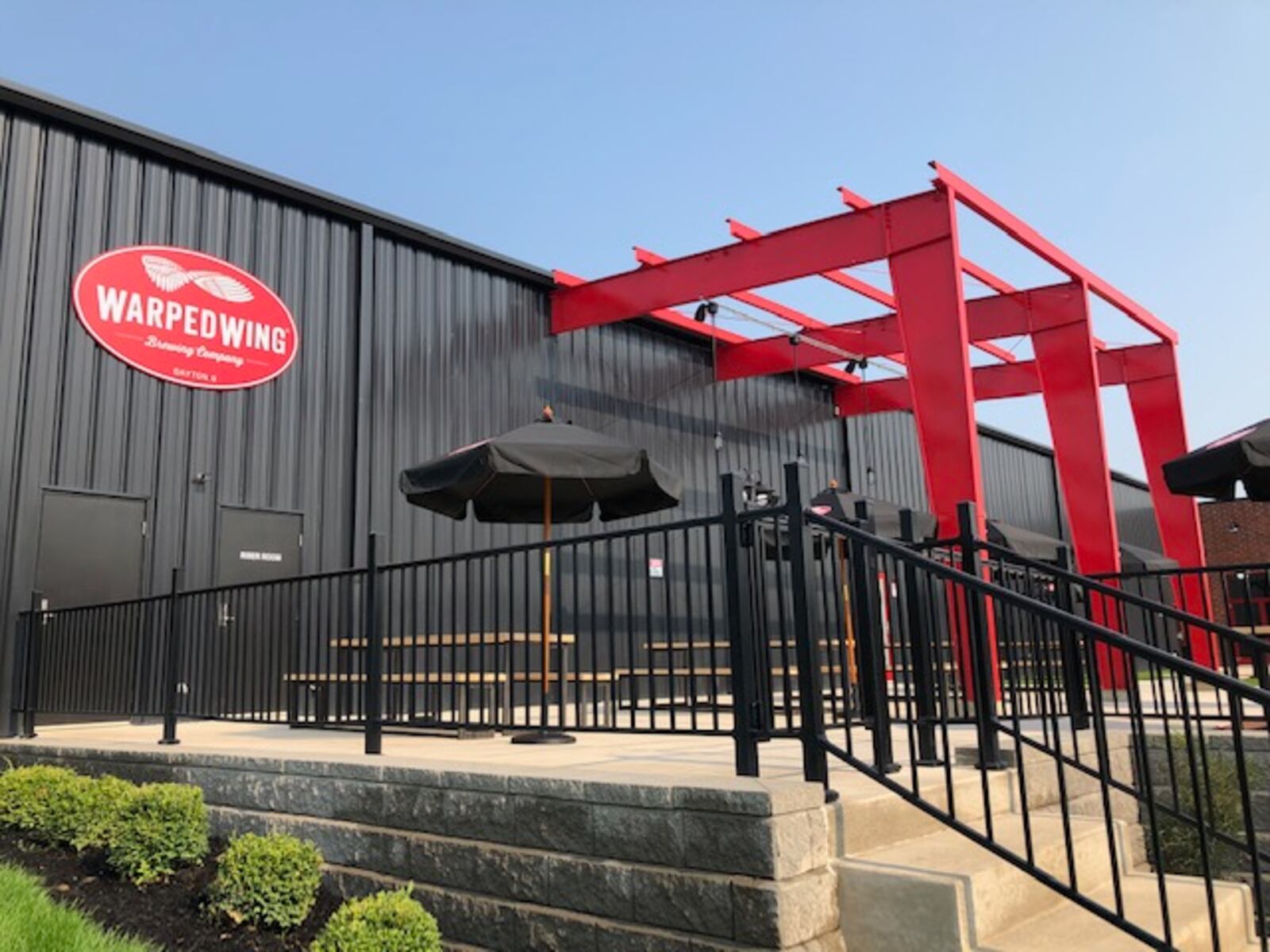 Dayton-based Warped Wing Brewing Co. will open its ambitious new second location, The Warped Wing Barrel Room & Smokery, to the public on Saturday, Aug. 29, in Springboro. MARK FISHER/STAFF


The 20,000-square-foot facility at the crossroads of Springboro at State Routes 73 and 741 will house a tap room, a restaurant, an outdoor biergarten-style patio, a large space for barrel-aging beers, a test-pilot brewery, a distribution hub and event space