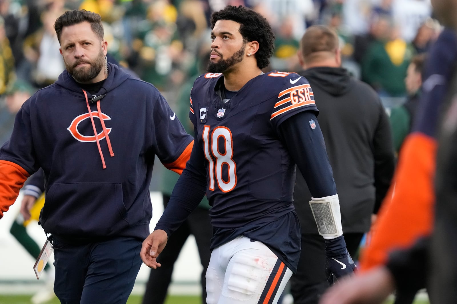 Chicago Bears' Caleb Williams walks off the field after an NFL football game against the Green Bay Packers Sunday, Nov. 17, 2024, in Chicago. The Packers won 20-19. (AP Photo/Nam Y. Huh)