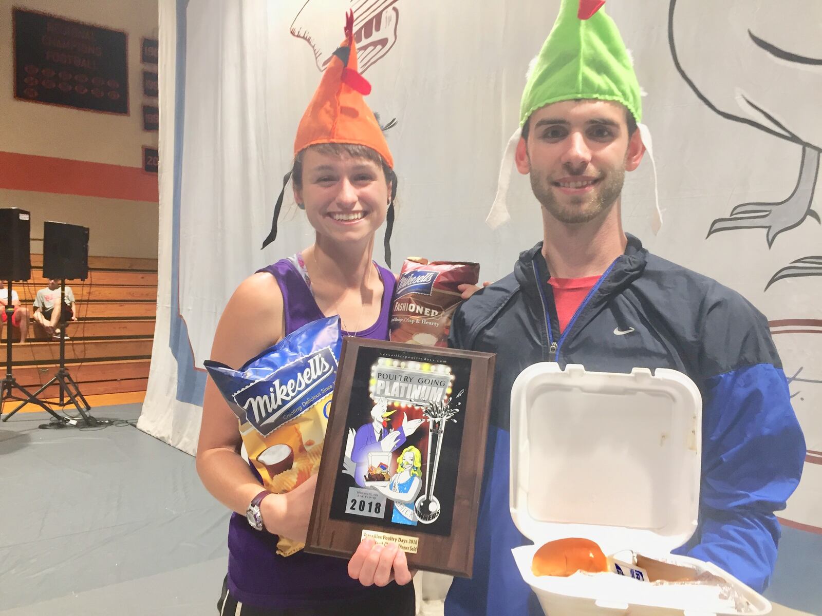 Ryan Stoneberger and his fiancee pose with their prizes after purchasing the One Millionth chicken dinner at Poultry Days in Versailles in 2018. CONTRIBUTED