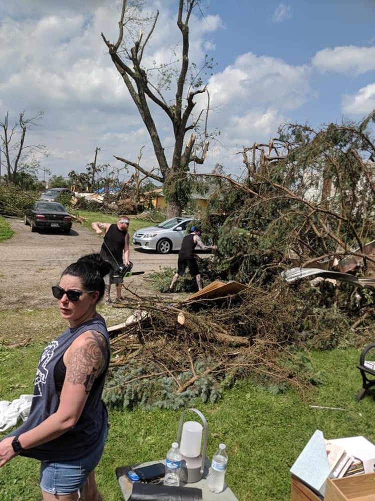 Photos: Community rallies around Dayton restaurant owner after son’s death, tornado