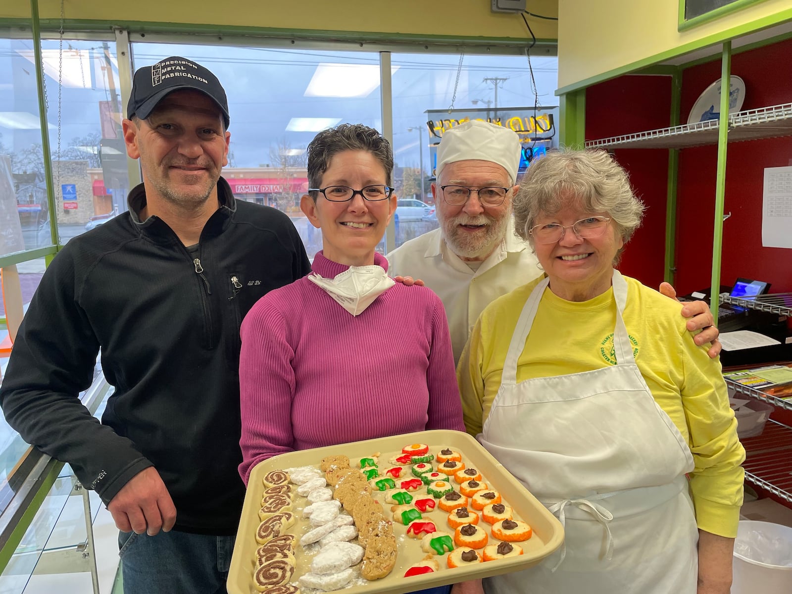 Evans Bakery, located at 700 Troy St. in the Old North Dayton neighborhood, closed its doors in December. Pictured (left to right) Matt Tepper, Jennifer Evans, Bill Evans and Rosemary Evans. NATALIE JONES/STAFF