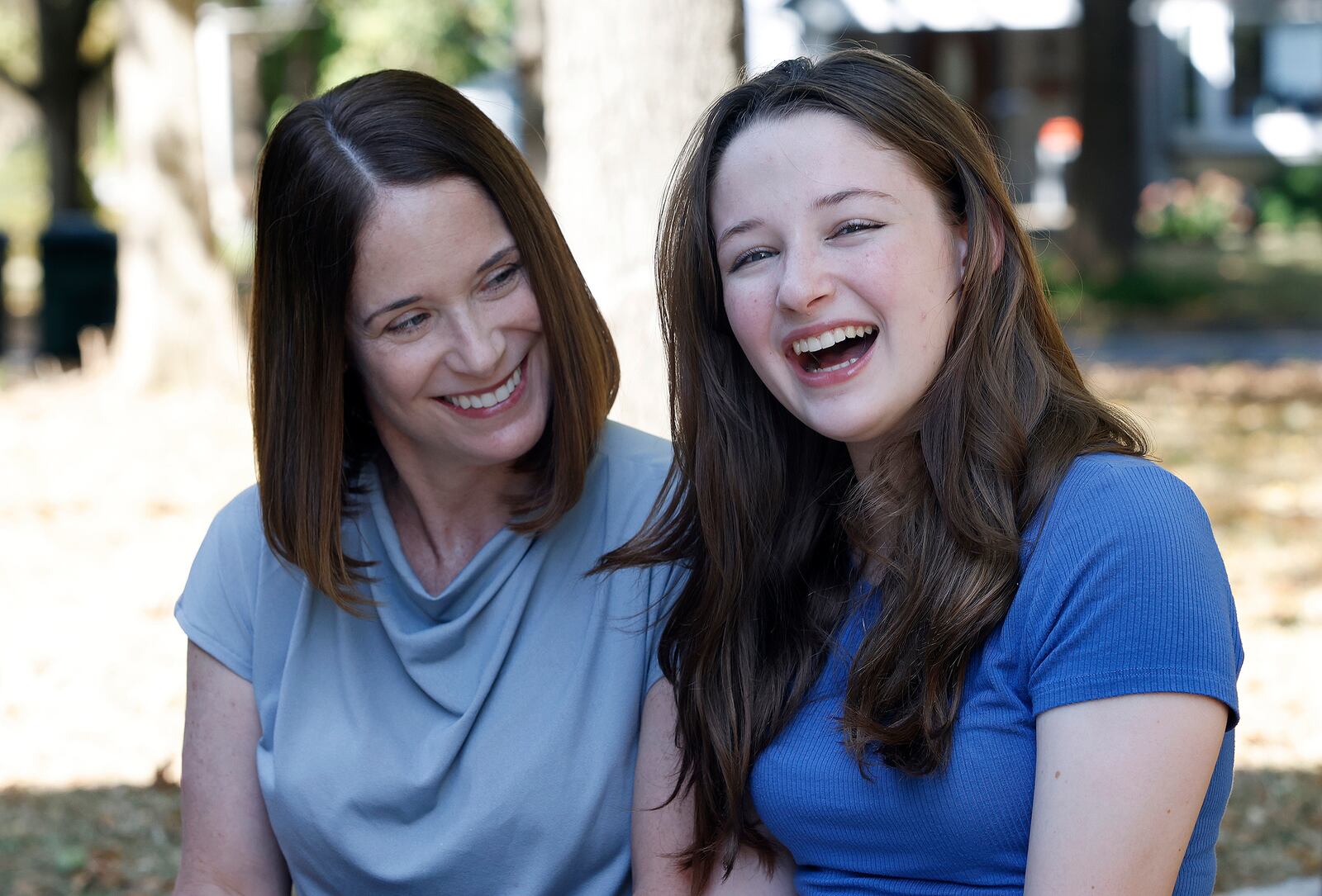 Erin Handler, left, with her daughter, Kay at the Wright Library in Oakwood. MARSHALL GORBY\STAFF