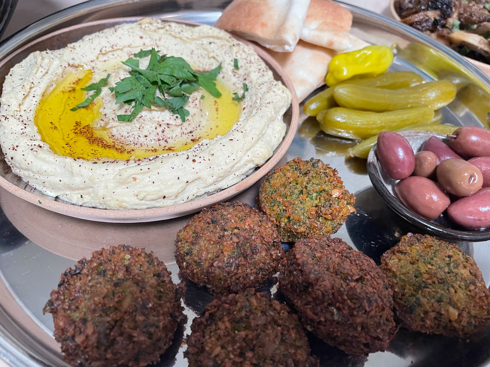 MAZU, a vegan restaurant inspired by Indian, Israeli and Taiwanese cuisines, is open at 229 Xenia Ave. in Yellow Springs. NATALIE JONES/STAFF