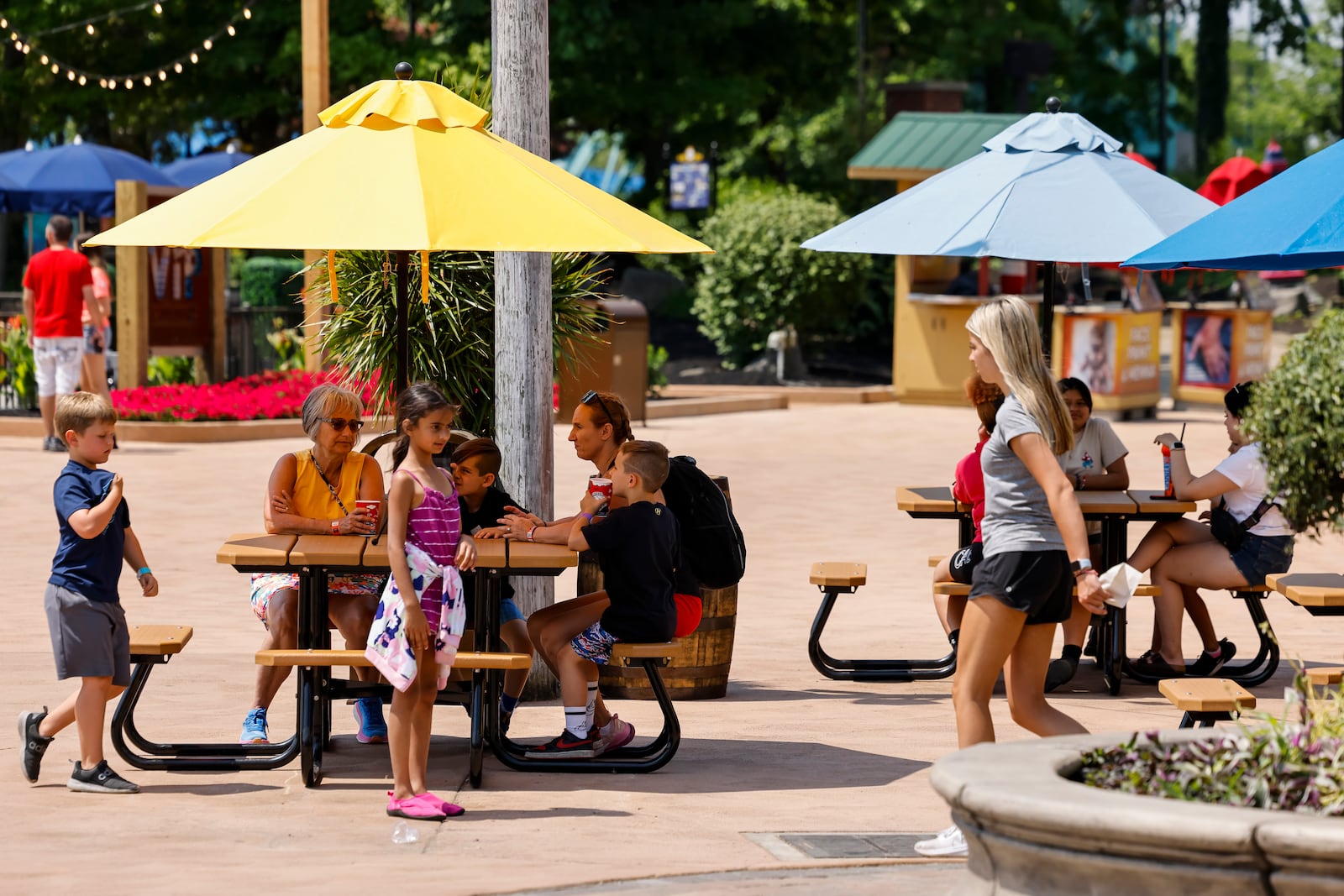 Kings Island visitors got to experience the newest themed area "Adventure Port" before the official opening day Friday, June 9, 2023 in Mason. The area features Enrique's Restaurant and Mercados Patio Bar, Adventure Express coaster and two new rides, Sol Spin and Cargo Loco. NICK GRAHAM/STAFF