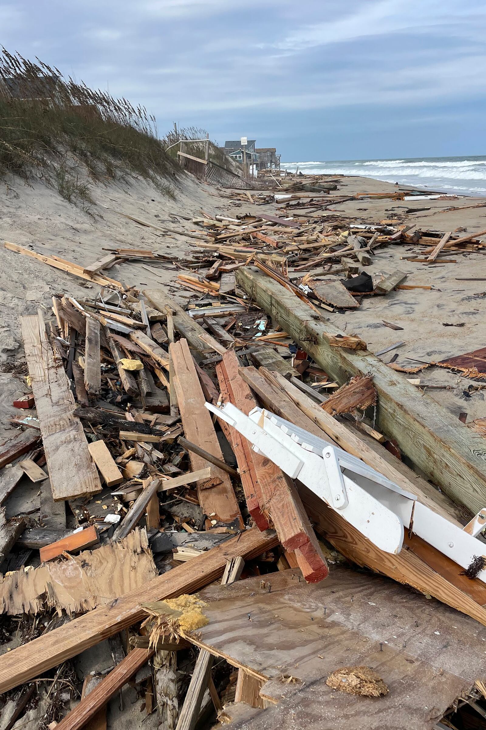 This photo provided by Cape Hatteras National Seashore shows debris from a collapsed house in Rodanthe, N.C., on Wednesday, Sept. 25, 2024. (Cape Hatteras National Seashore/National Park Service via AP)