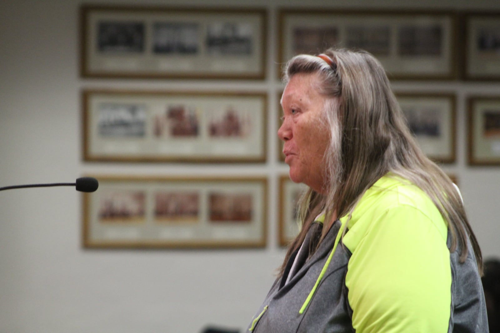 Reggie Swickard, who lives on Nordale Avenue, talks about the Belmont business district at a Dayton City Commission meeting. CORNELIUS FROLIK / STAFF